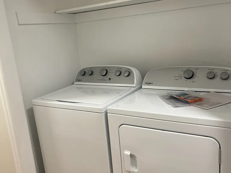 Brand new washer / dryer in hall alcove