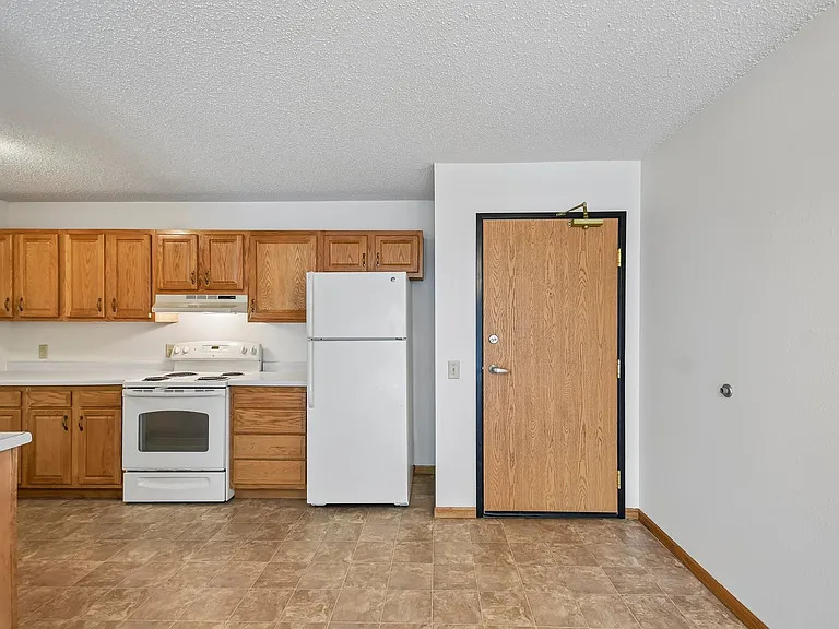Elevate your lifestyle at Mill Pond Apartments with this inviting kitchen featuring modern appliances and ample storage. Enjoy a spacious layout perfect for entertaining or relaxing. Schedule your tour today to see your new home!