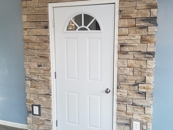 New Entry Door with Stone Veneer
