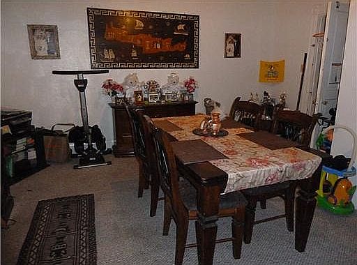 The three-bedroom unit also has a large dining room