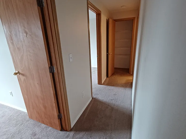 Upstairs hallway with closet storage