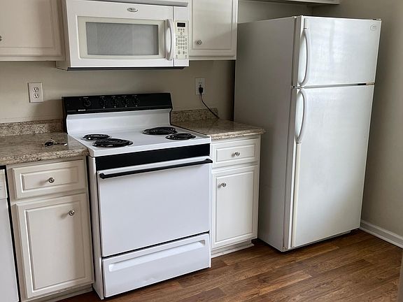 Kitchen - stove and refrigerator