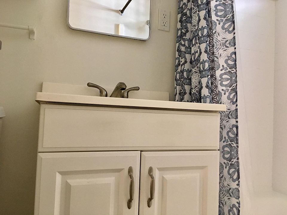 Vanity storage; additional bath storage not pictured