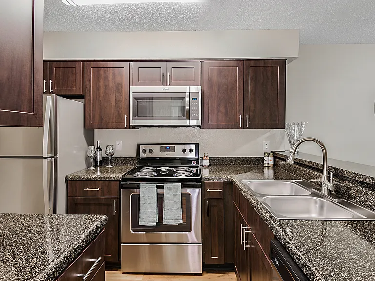 Open Kitchen with Stainless Appliances