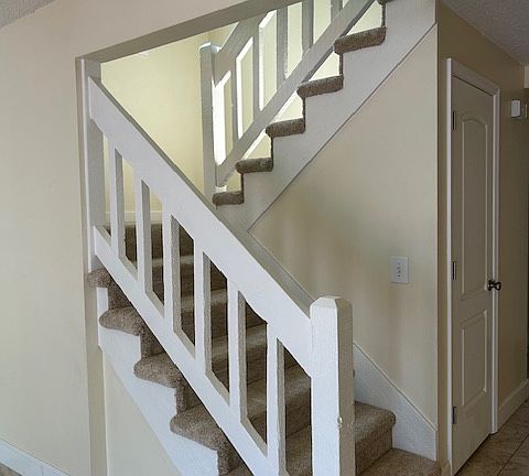 Stairs leading to upstairs 3 bedroom