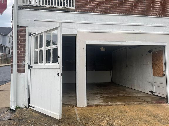 roll up door on keypad & remote; extra wide man door with deadbolt
