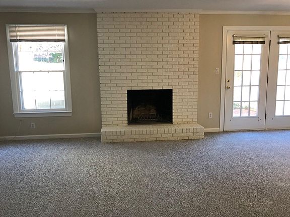 Living area with door to patio