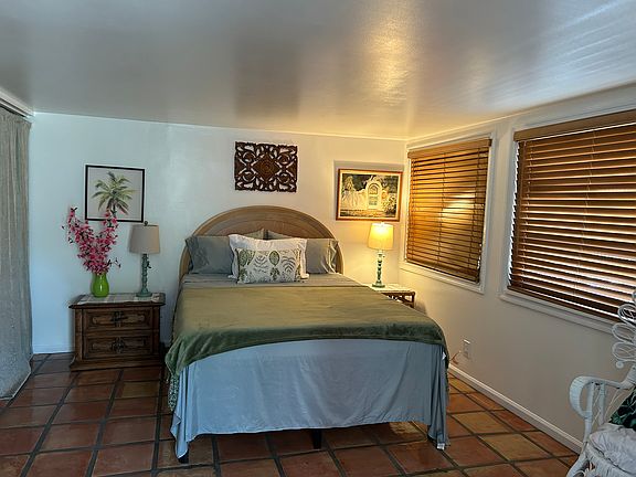 Main Room with Queen bed peacefully decorated