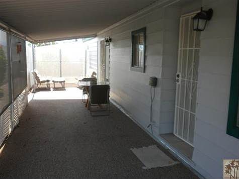 Access to patio from both the living room front door and the family room.