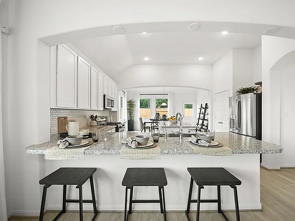 Kitchen with breakfast bar island