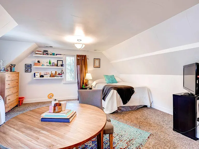 Bright and airy feeling with 4 large windows and vaulted cei