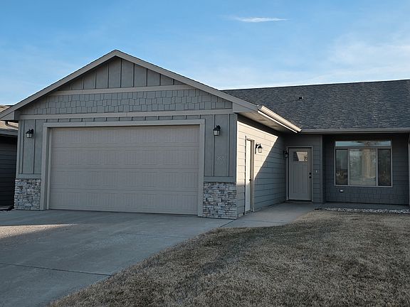 2 car garage. Lawn/Snow included in rent. Fall/Winter view.