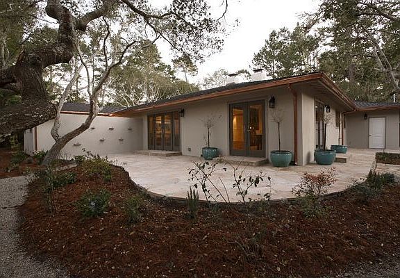 Stone patio on rear of house