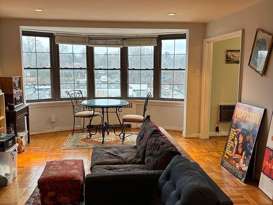 Living room with bay windows