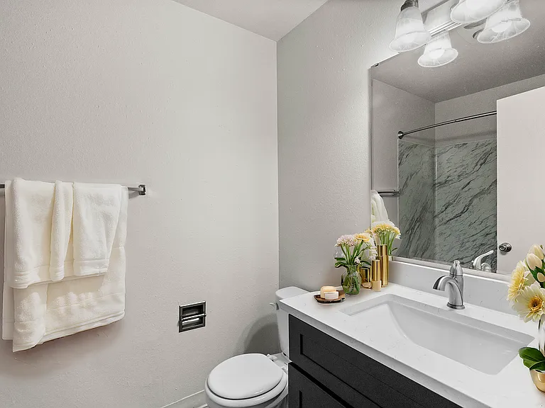 Step into elegance with this stylish bathroom, featuring luxurious finishes and a serene ambiance.