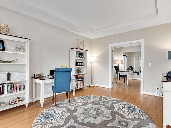 Box Ceiling in Living Room; White Trim & Doors Throughout.