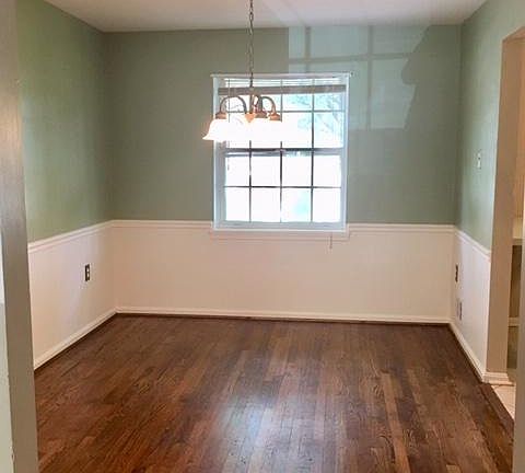 Formal dining room fits a 6-person table