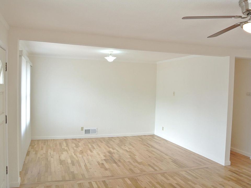 Previous owner removed wall and added bedroom space to extend Living Room making the living space feel very large and inviting