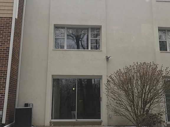 The back of the house offers a patio