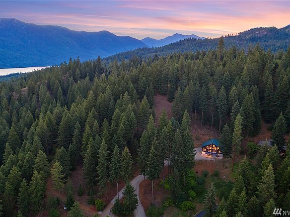 Nestled in the trees with easy access to 4 seasons of recreation!