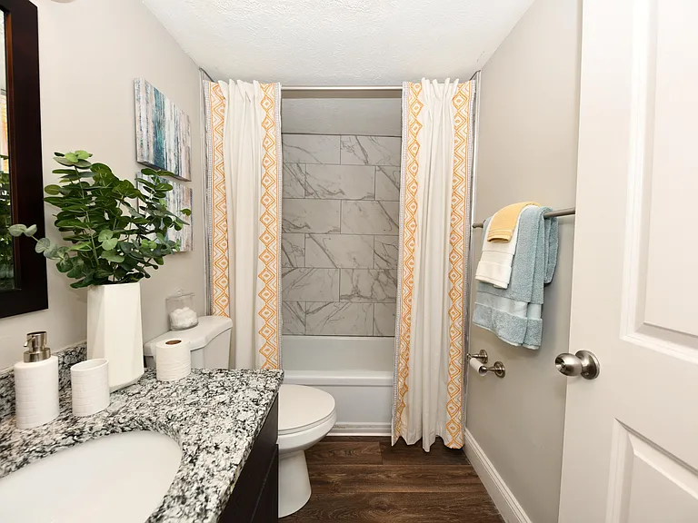 Bright bathroom with granite counters