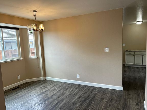 Dining room area, kitchen is through to the right.