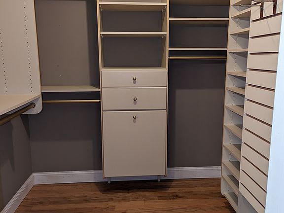 Custom California Closets in master bathroom