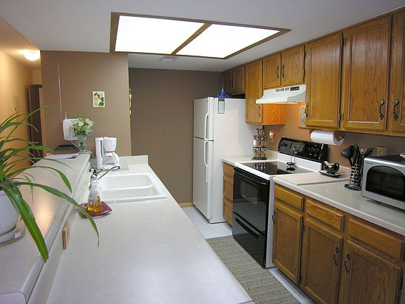 Tile kitchen floors, refrigerator included 