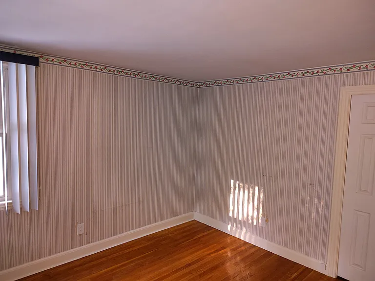 Front room, potential additional bedroom with closet, but no door.