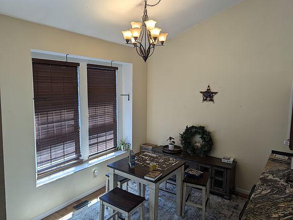 Main Level: 
A welcoming entry room and dining area situated at the front of the house, just off the kitchen_ideal for greeting guests and enjoying shared meals.