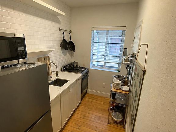 4th image of 8415 Harding Ave APT 14