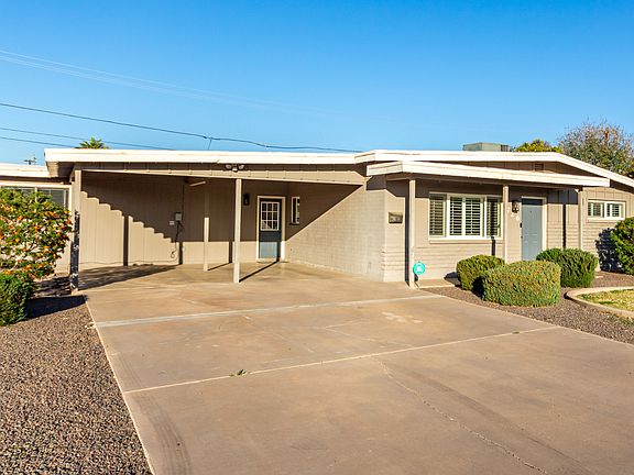 Two carport covered parking and plenty of pad parking