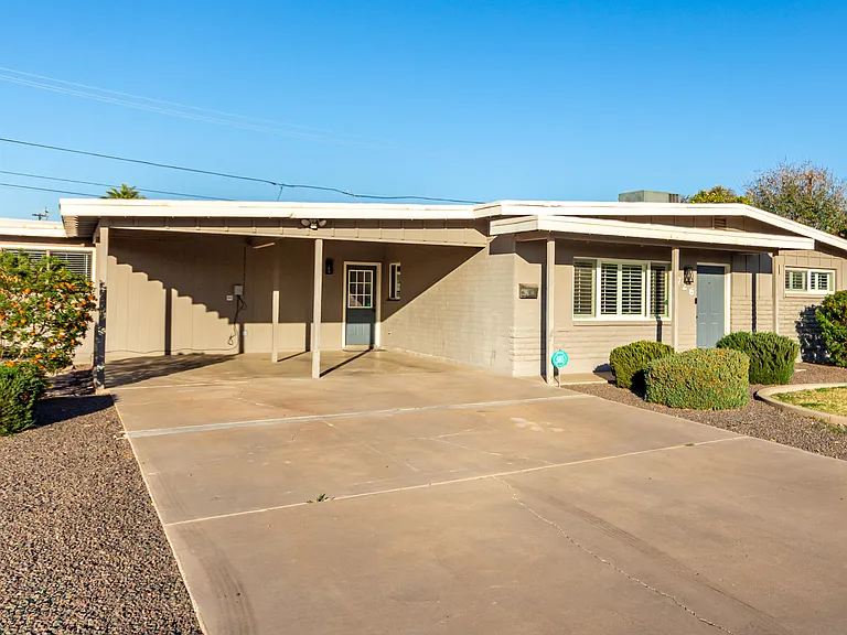 Two carport covered parking and plenty of pad parking