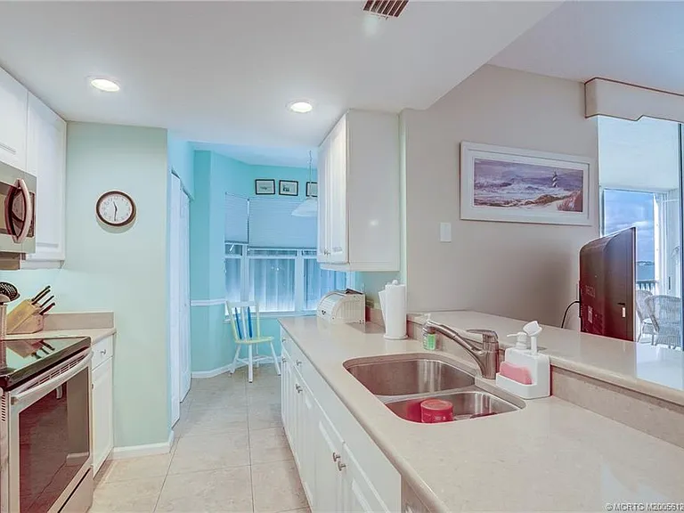 5750 NE Island Cove Way #3203 — Photo 34