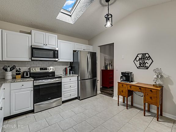 4th image of 11187 MIKRIS Drive N