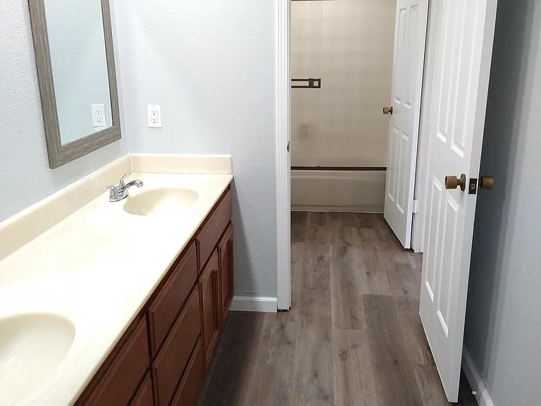 master bath with 3 sinks
