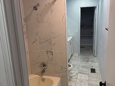 Master bath with walk in closet