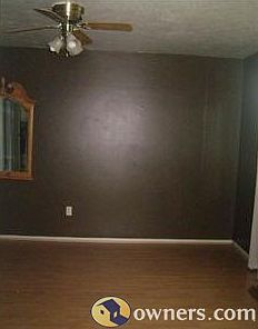 looking into the bedroom from the bathroom