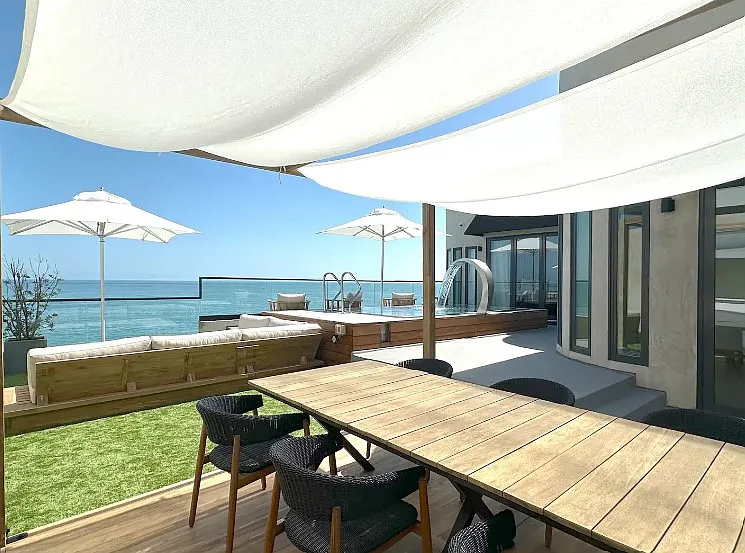 Enjoy outdoor meals in the dedicated dining area on the upper deck.