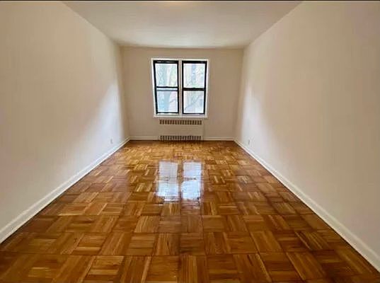 5th image of 66-20 Wetherole St #1DD