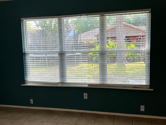 new double pane windows in the living room for a great view of the backyard
