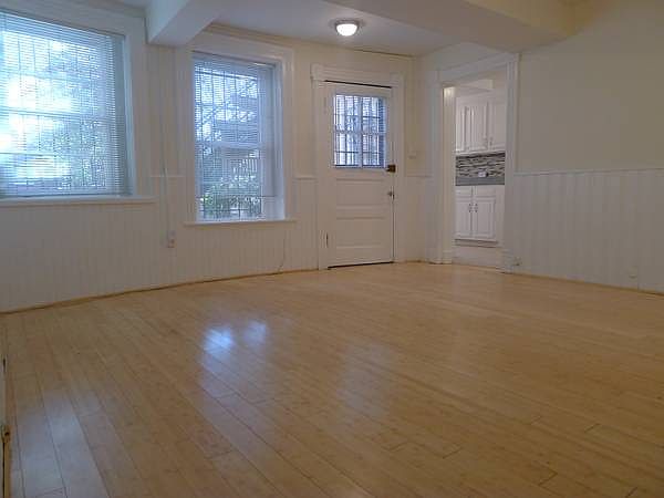 Living area with view into kitchen