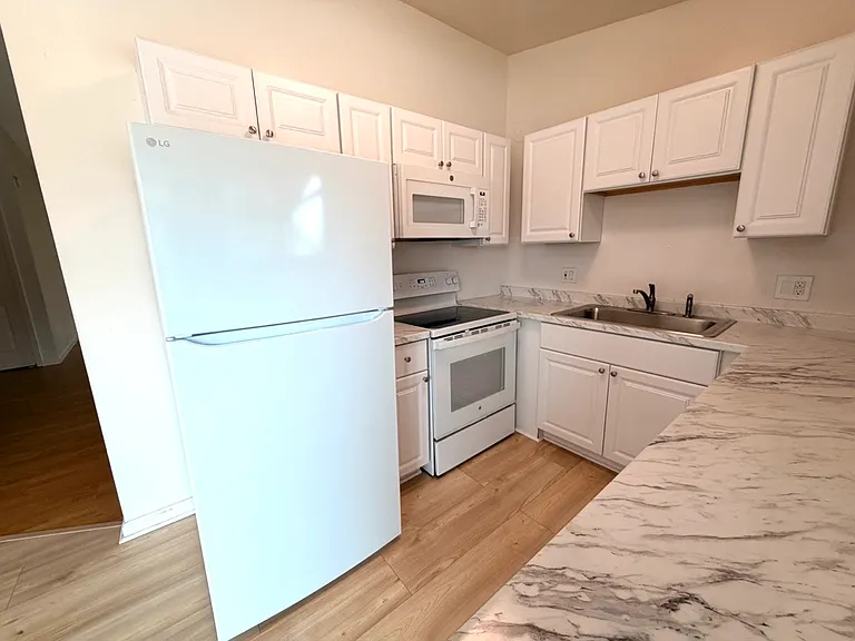 Kitchen - new flooring, like new appliances