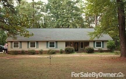 Front of house with circle drive