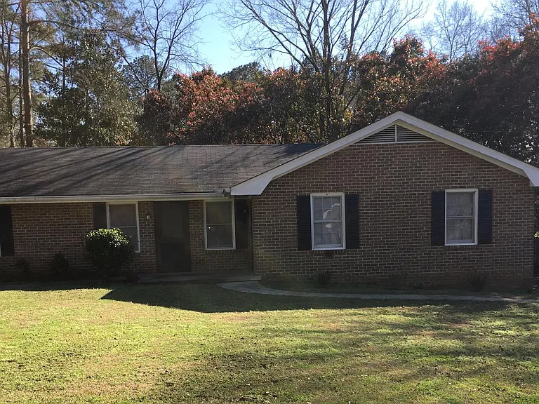 Ranch style duplex is desired area with private driveway
