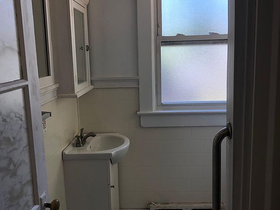 Fresh, full bath on main floor- right across from office space/fourth bedroom- could be great for roommate, mother in law, etc.