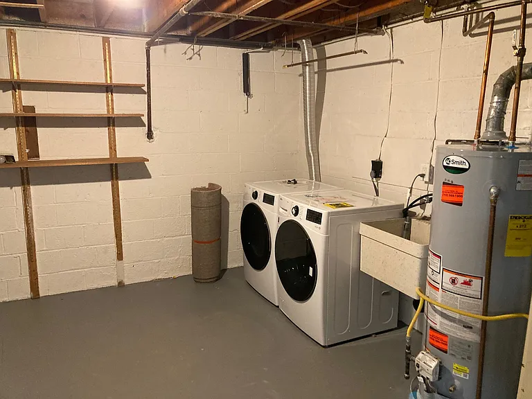 Utility Room. New washer and dryer. Fresh paint.