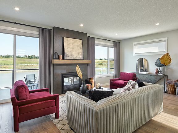 Relax in this modern living room, where contemporary design meets comfortable sophistication.