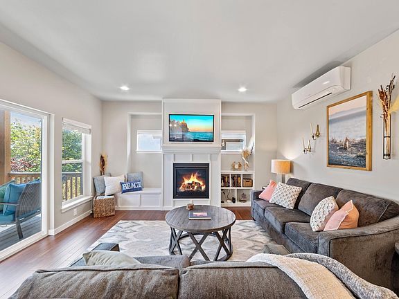 First floor- includes an open floor plan with kitchen/dining room/kitchen. Also has a small wet room and a bathroom. Access to the first floor large patio.