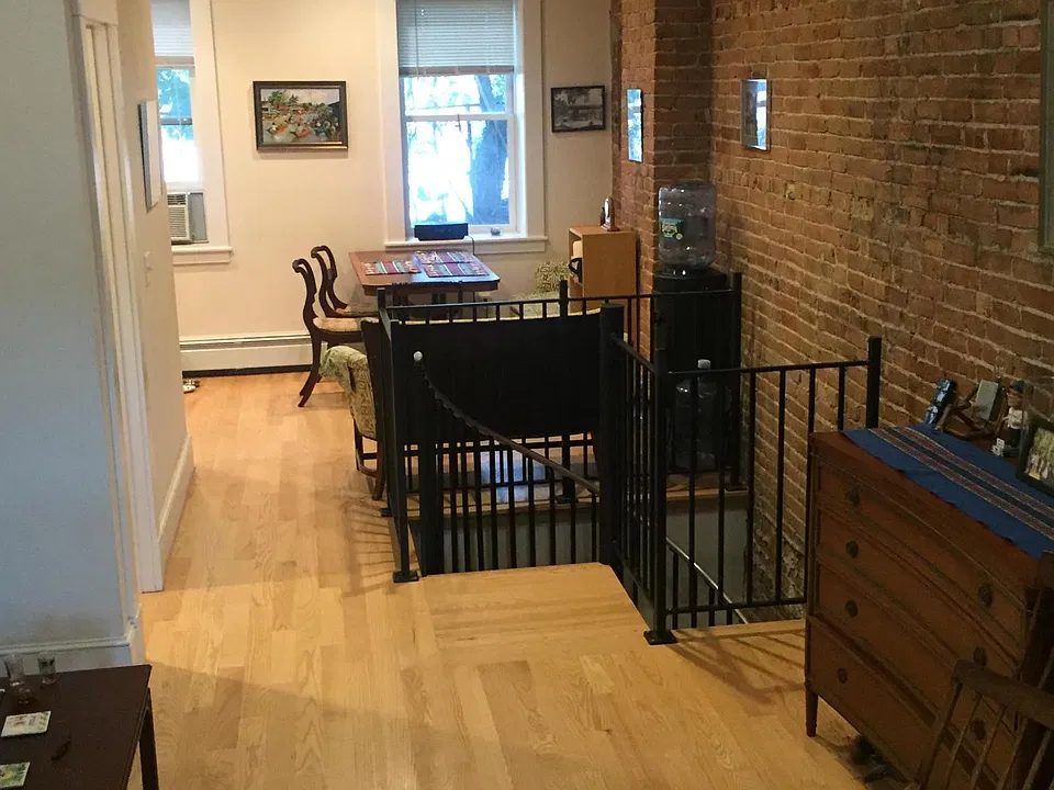 Kitchen/Living area with spiral stairs to lower level